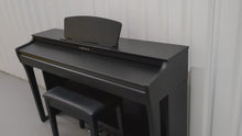 Load and play video in Gallery viewer, Yamaha clavinova CLP-725 digital piano and stool in satin black stock #25010
