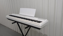 Load and play video in Gallery viewer, Yamaha P-115 digital portable piano with collapsible stand and pedal white stock #25325
