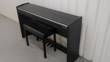 Load and play video in Gallery viewer, Roland F140R Digital Piano in satin black slim line space saver stock # 25303
