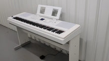 Load and play video in Gallery viewer, Yamaha DGX-660 in white 88 Key Weighted Keys Portable Grand, stand stock # 24348
