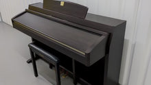 Load and play video in Gallery viewer, Yamaha Clavinova CLP-240 Digital Piano and stool in dark rosewood stock nr 24140
