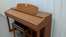 Load and play video in Gallery viewer, Yamaha Clavinova CLP-150 digital piano + stool in cherry wood finish stock 24343
