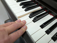 Load image into Gallery viewer, Roland DP-990r digital slim line space saving piano in polished ebony black stock # 25516
