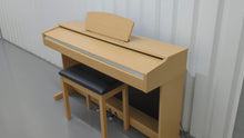 Load and play video in Gallery viewer, Yamaha Arius YDP-140 digital piano and stool in light oak / cherry wood finish stock number 23106
