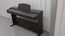 Load and play video in Gallery viewer, Roland HP101e Digital Piano in rosewood weighted keys 3 pedals, stock # 23082
