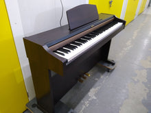 Load image into Gallery viewer, Roland HP101e Digital Piano Full Size 88 weighte keys 3 pedals, stock nr 22033
