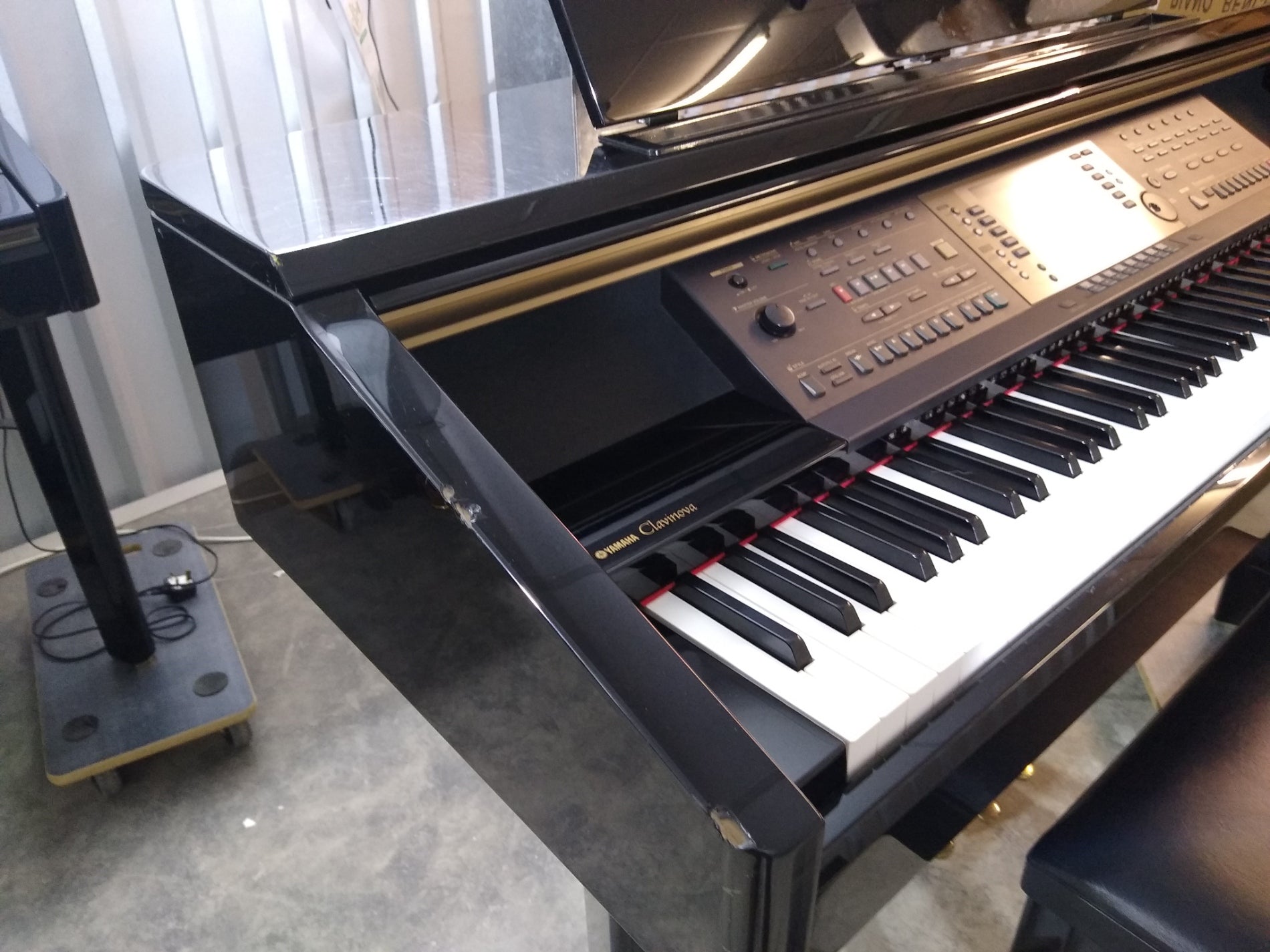 Yamaha Clavinova CVP-209 in Polished Ebony with matching stool. stock –  Sulinda Music