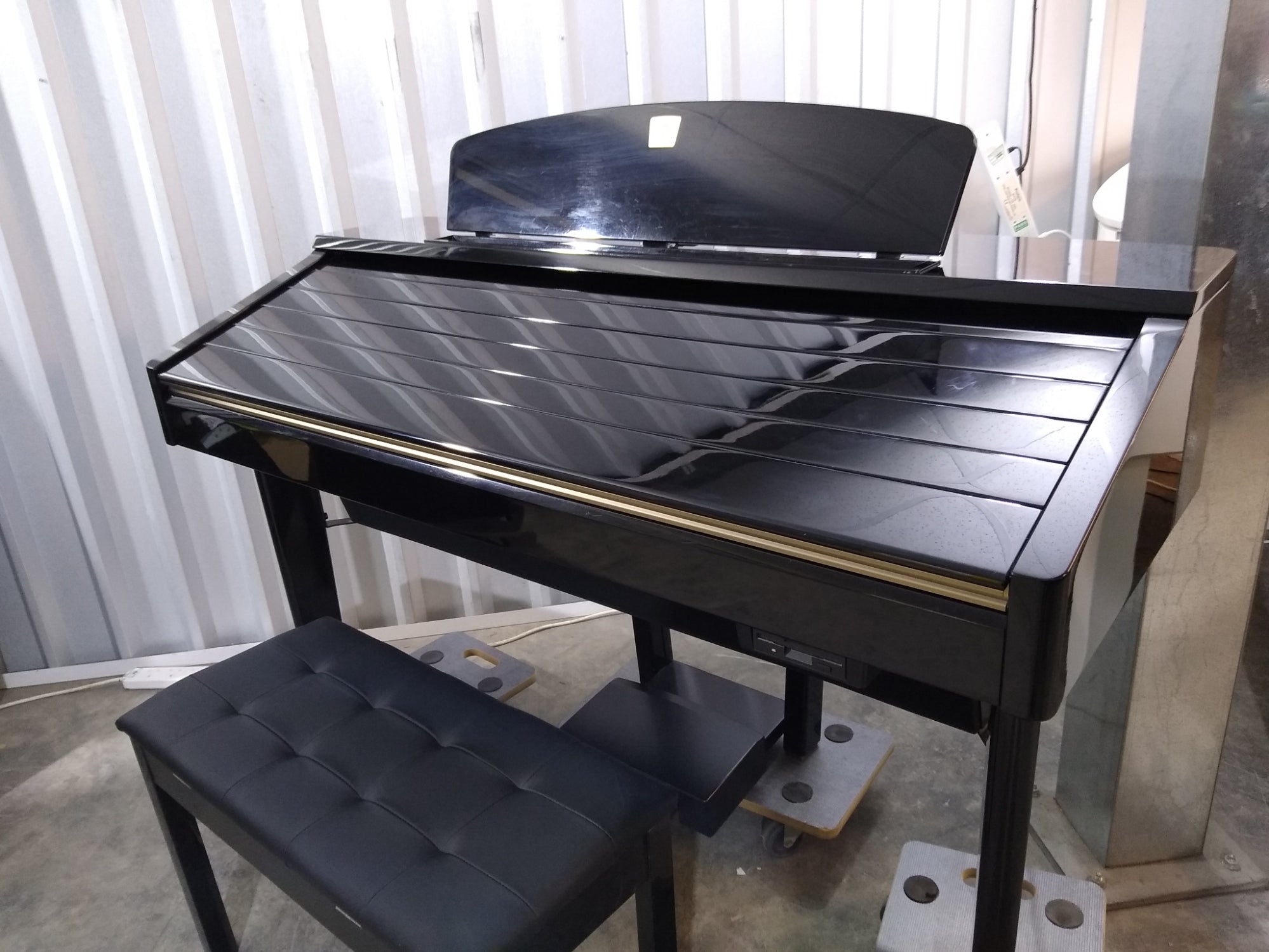 Yamaha Clavinova CVP-209 in Polished Ebony with matching stool. stock –  Sulinda Music