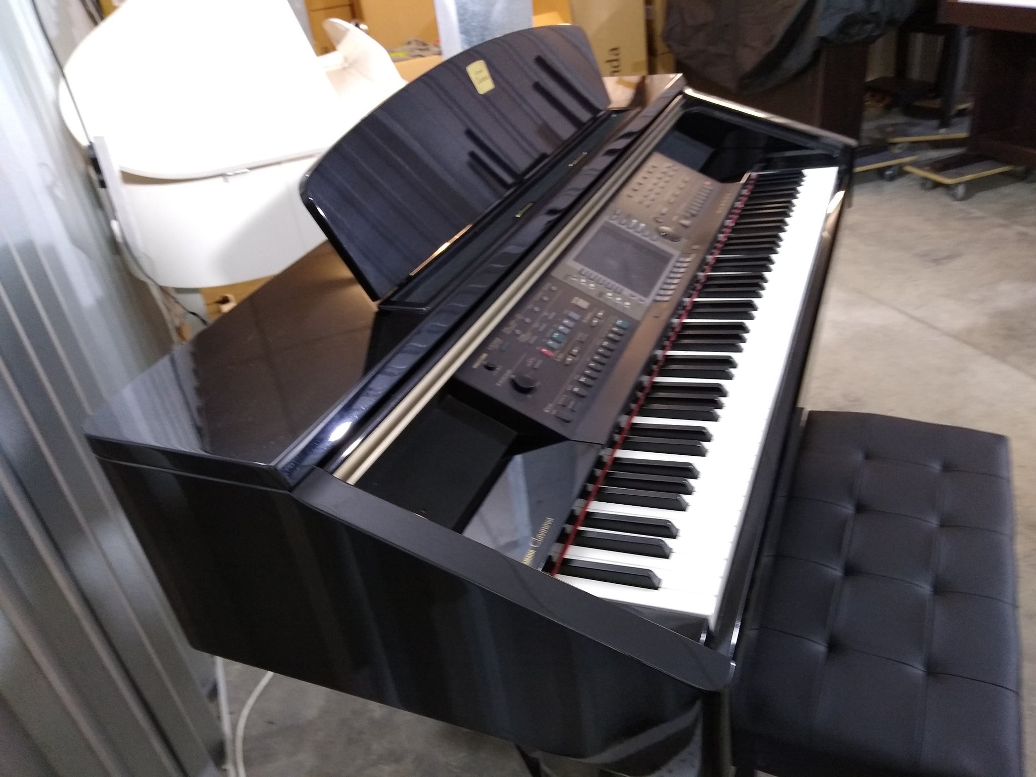 Yamaha Clavinova CVP-209 in Polished Ebony with matching stool. stock –  Sulinda Music