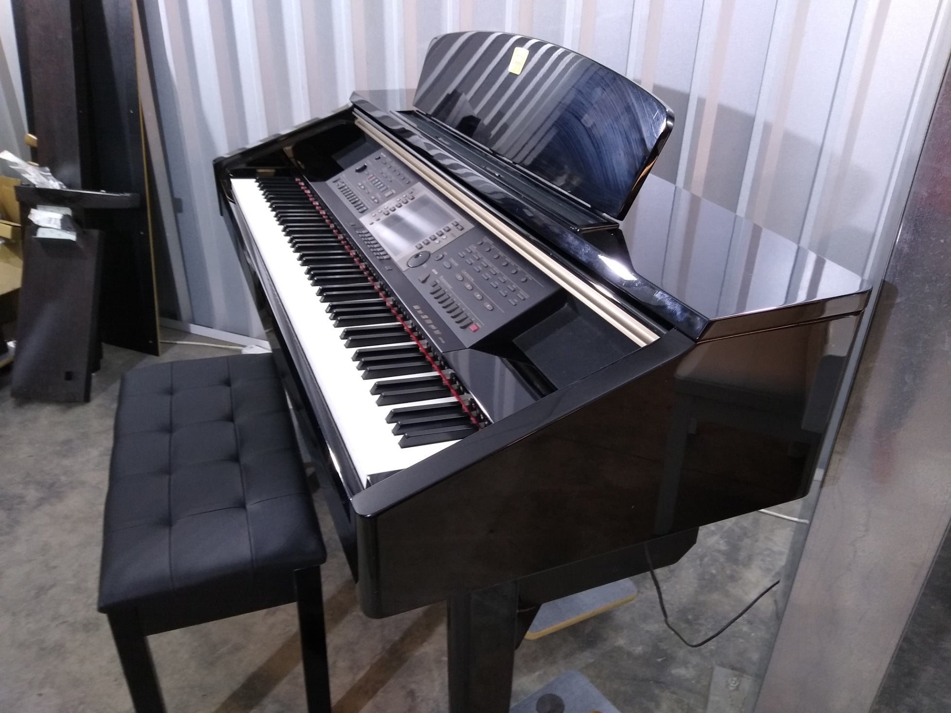 Yamaha Clavinova CVP-209 in Polished Ebony with matching stool. stock –  Sulinda Music