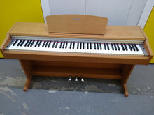 Load image into Gallery viewer, Yamaha Arius YDP-131 Digital Piano in ligght oak finish stock nr 22091
