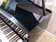 Load image into Gallery viewer, Yamaha Clavinova CLP-565GP in polished glossy black + matching stool.
