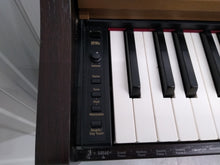 Load image into Gallery viewer, Roland HP101e Digital Piano with stool weighted keys 3 pedals, stock # 22127
