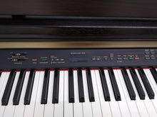 Load image into Gallery viewer, Yamaha Clavinova CLP-130 Digital Piano and stool in rosewood stock number 22327
