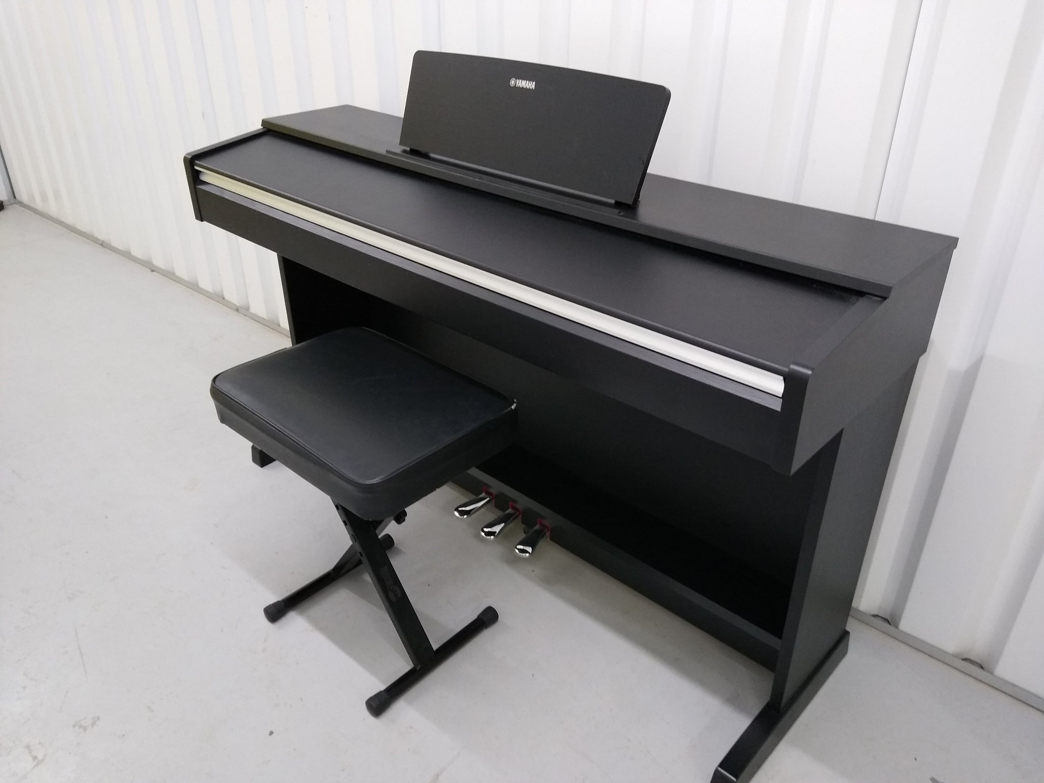 Yamaha Arius YDP-142B Digital Piano in black weighted keys stock