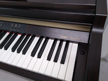 Load image into Gallery viewer, YAMAHA CLAVINOVA CLP-930 Digital Piano in rosewood, weighted keys, comes with stool.  stock nr 22131
