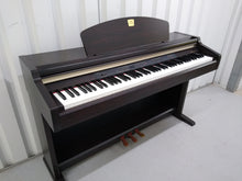 Load image into Gallery viewer, YAMAHA CLAVINOVA CLP-930 Digital Piano in rosewood, weighted keys, comes with stool.  stock nr 22131
