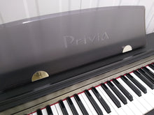 Load image into Gallery viewer, Casio Privia PX-730 Compact slimline Digital Piano Full size . Stock no 22175
