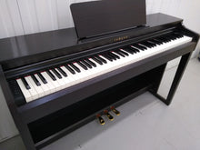 Load image into Gallery viewer, Yamaha clavinova CLP-525 digital piano in rosewood colour stock # 22210

