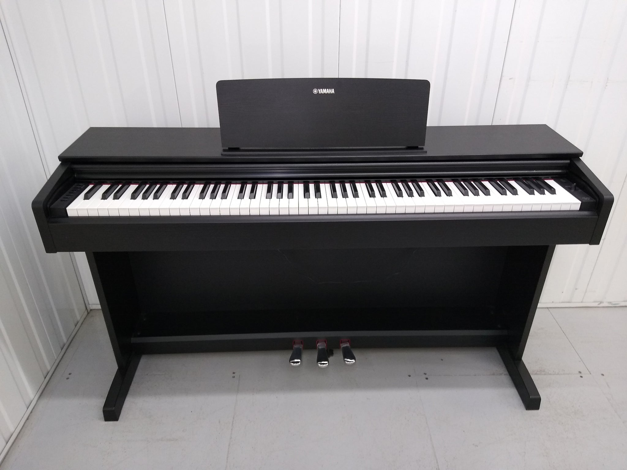 Yamaha Arius YDP-143 Digital Piano satin black weighted keys stock
