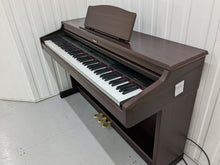 Load image into Gallery viewer, Roland HP-3E Digital Piano in mahogany Full Size 88 weighted keys Stock nr 22252
