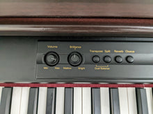 Load image into Gallery viewer, Roland HP-3E Digital Piano in mahogany Full Size 88 weighted keys Stock nr 22252
