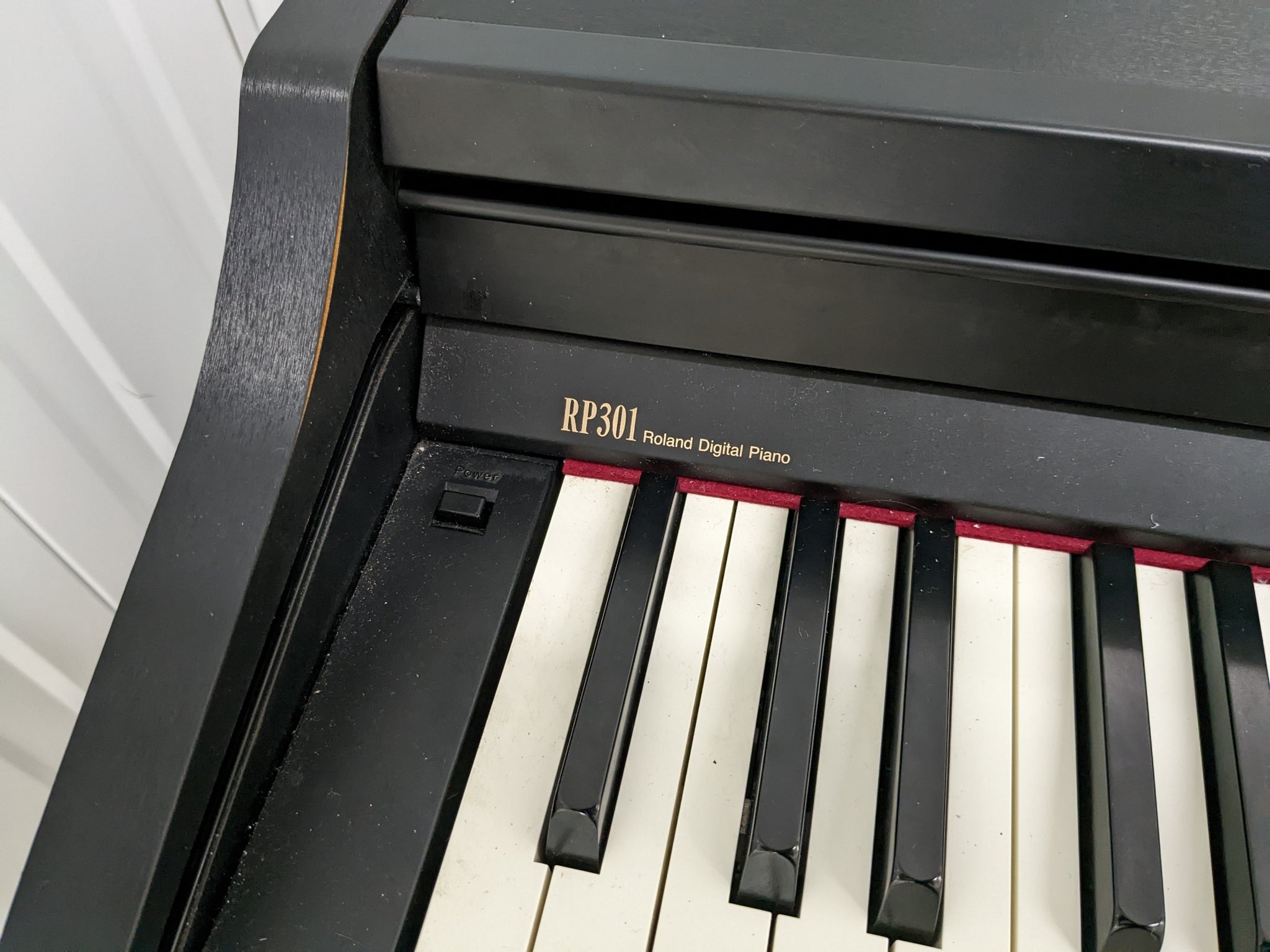 Roland RP301 Digital Piano and stool in black, full size, 3 pedals