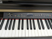 Load image into Gallery viewer, Yamaha Clavinova CLP-130 Digital Piano and stool in rosewood stock number 22298

