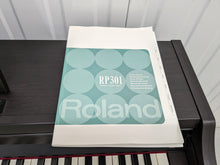 Load image into Gallery viewer, Roland RP301 Digital Piano and stool in rosewood stock # 22300
