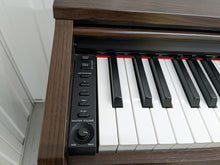 Load image into Gallery viewer, Yamaha Arius YDP-140 Digital Piano in rosewood stock number 22304
