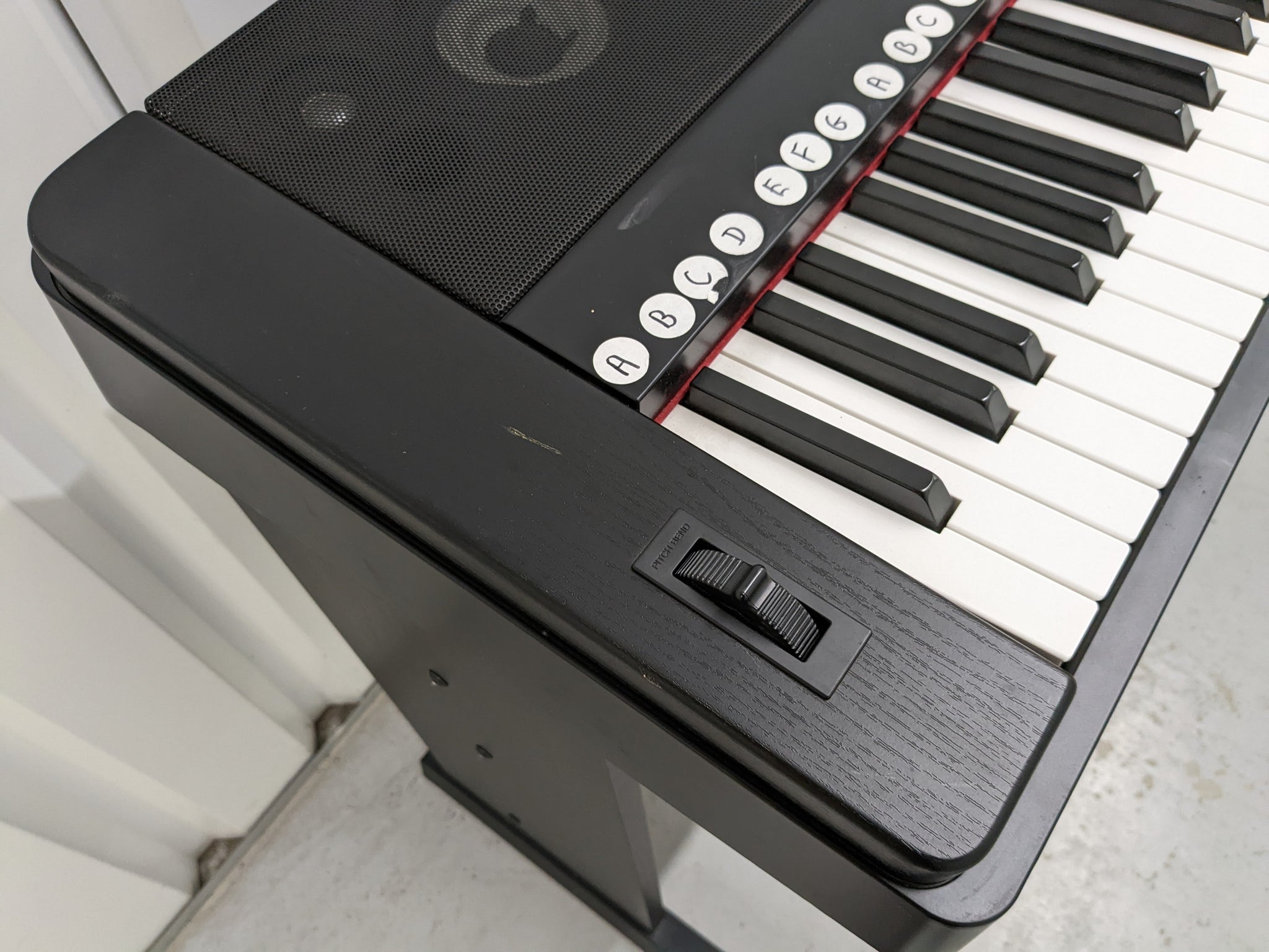 DISC Yamaha DGX 660 Digital Piano with Stand, Black
