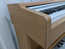 Load image into Gallery viewer, Yamaha Arius YDP-131 Digital Piano in cherry / light oak  finish stock nr 22308
