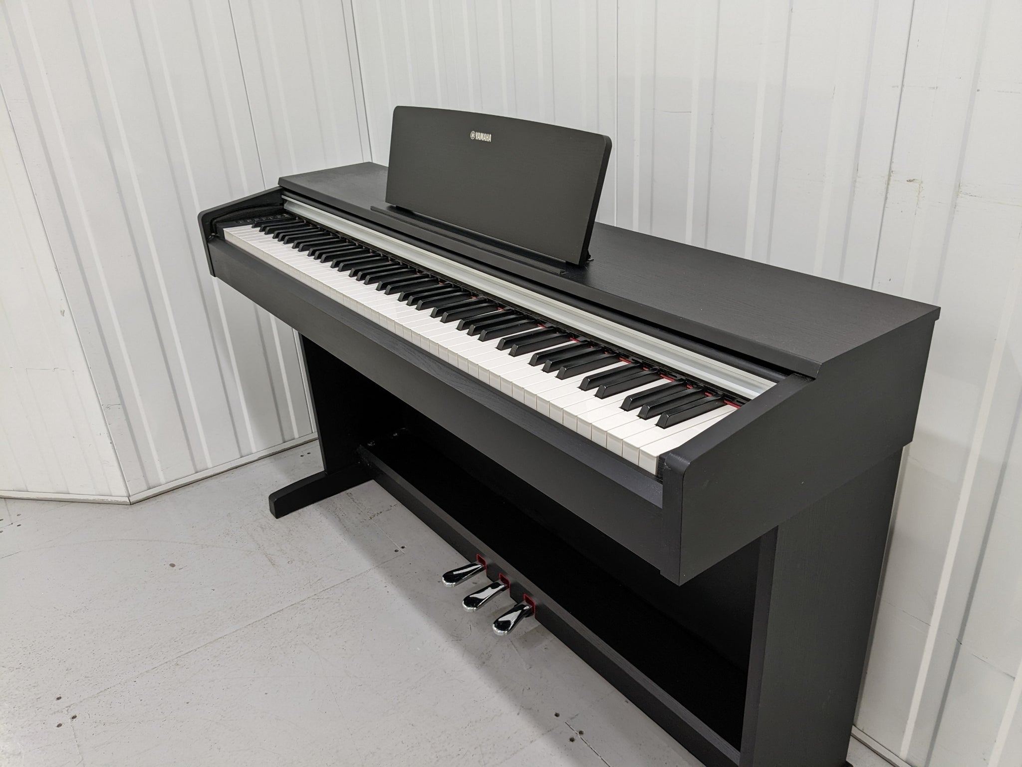 Yamaha Arius YDP-142 Digital Piano in satin black. Stock number