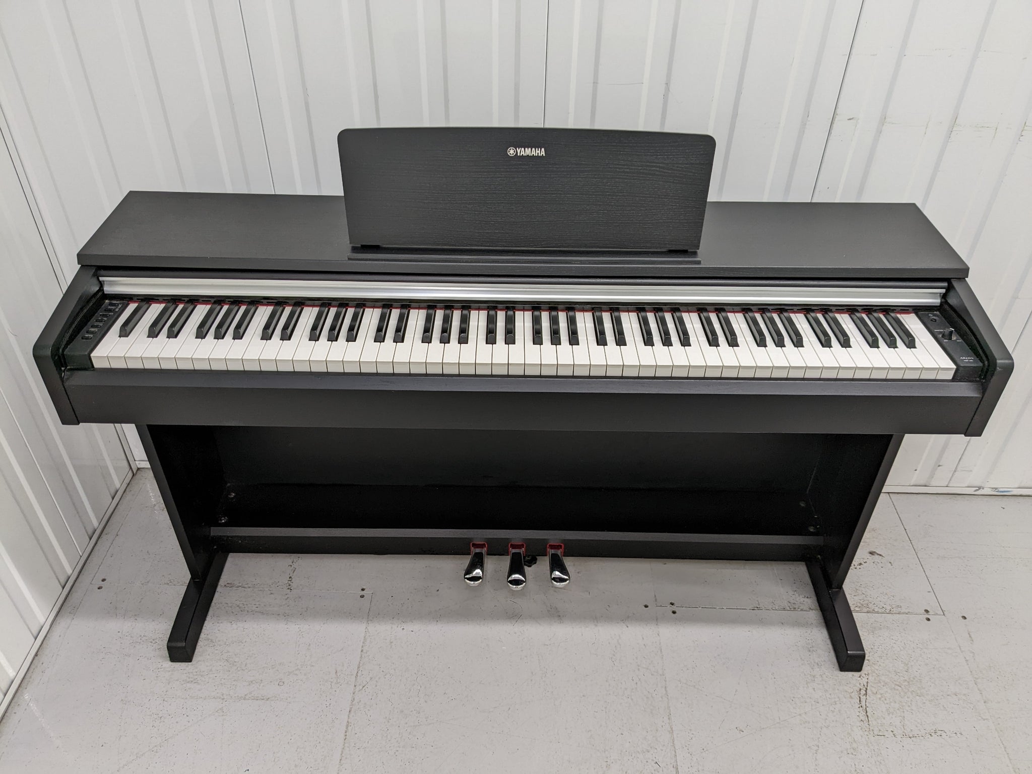 Yamaha Arius YDP-142 Digital Piano in satin black. Stock number
