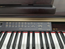 Load image into Gallery viewer, Yamaha Clavinova CLP-150 Digital Piano in dark rosewood colour stock nr 22380
