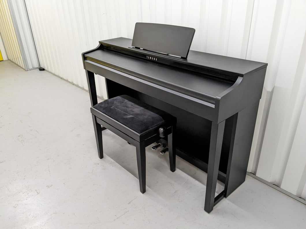 Yamaha clavinova CLP-525 digital piano and stool in satin black stock # 22378