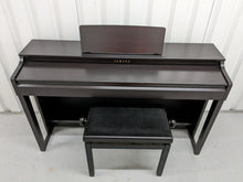 Load image into Gallery viewer, Yamaha clavinova CLP-525 digital piano and stool in dark rosewood stock # 22414
