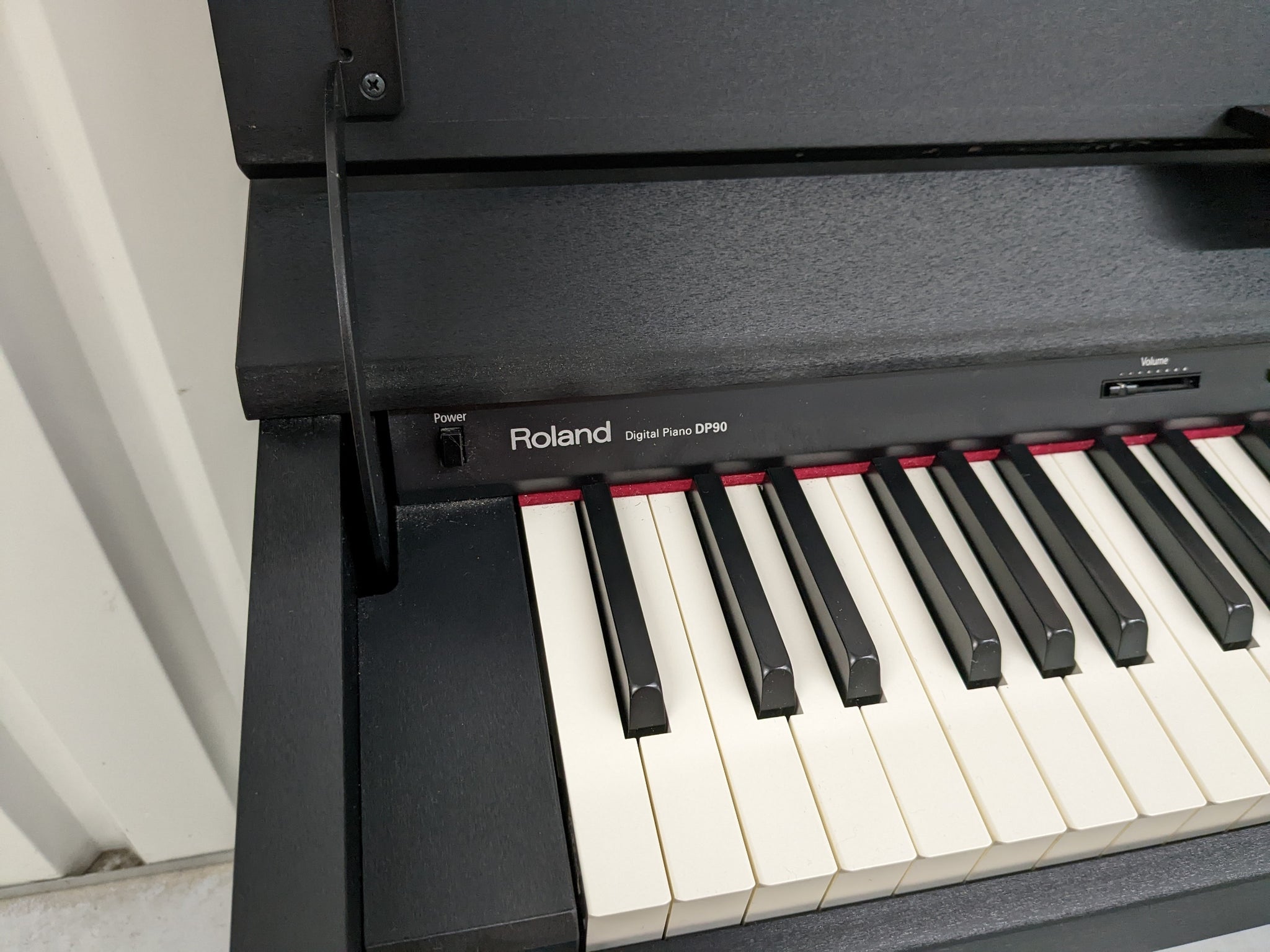 Roland DP90 digital slim line space saving piano in satin black stock –  Sulinda Music