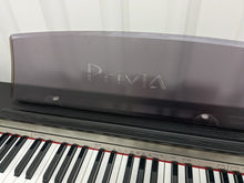 Load image into Gallery viewer, Casio Privia PX-730 Compact slimline Digital Piano in satin black. Stock no 22416
