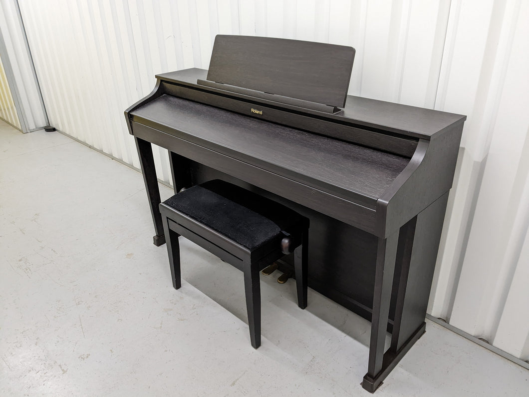 Roland HP-505 Digital Piano and stool in dark rosewood wooden action keys  Stock  nr 22439