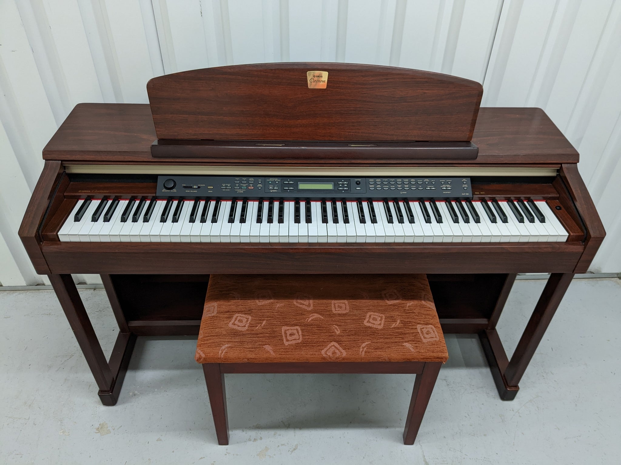 Yamaha Clavinova CLP-150 Digital Piano with stool in mahogany