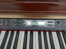 Load image into Gallery viewer, Yamaha Clavinova CLP-150 Digital Piano with stool in mahogany stock nr 23006
