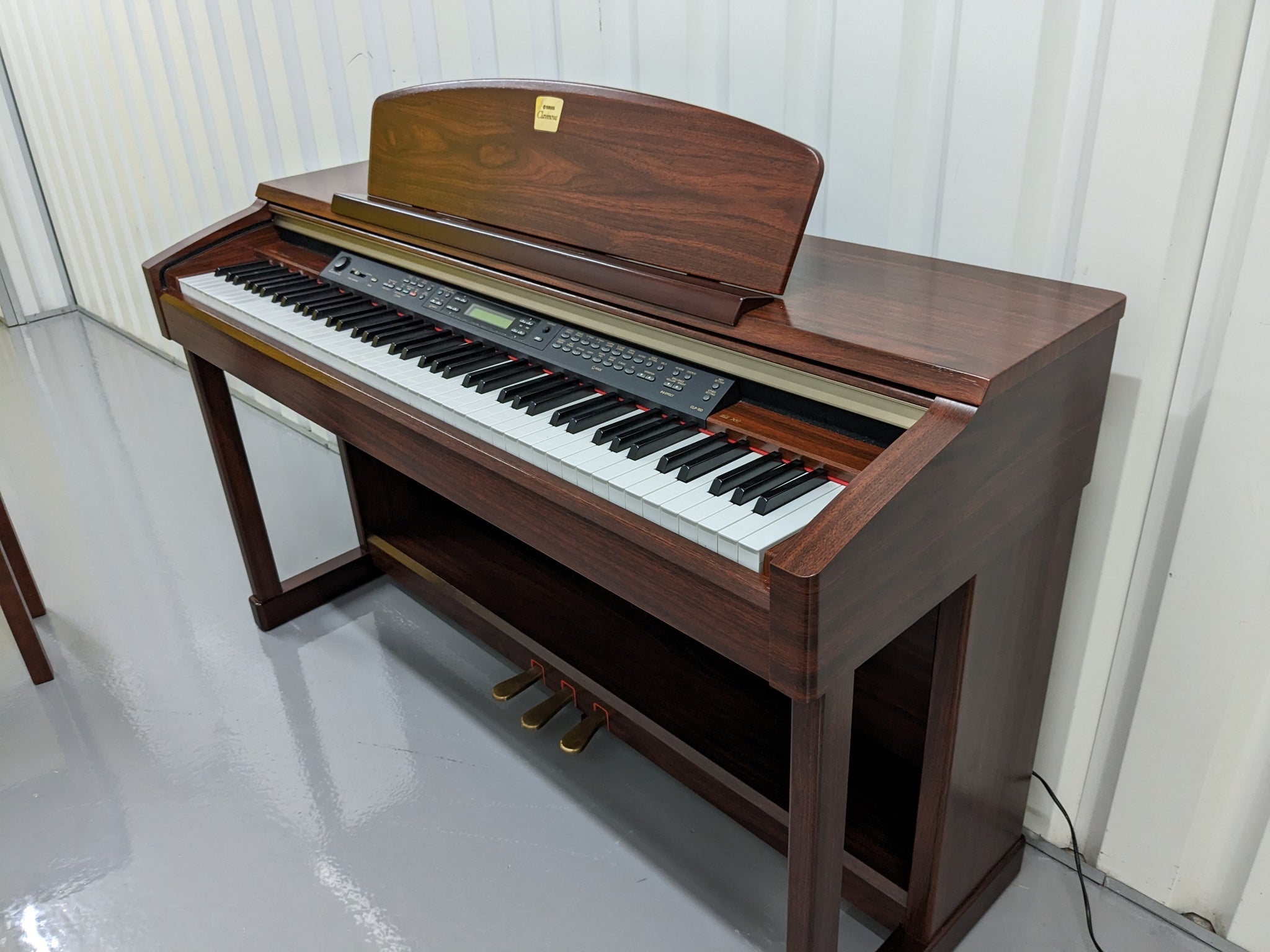 Yamaha Clavinova CLP-150 Digital Piano with stool in mahogany stock nr –  Sulinda Music