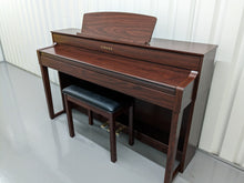 Load image into Gallery viewer, Yamaha Clavinova CLP-545 in mahogany with stool. stock nr 23037
