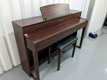 Load image into Gallery viewer, Yamaha Clavinova CLP-545 in mahogany with stool. stock nr 23037
