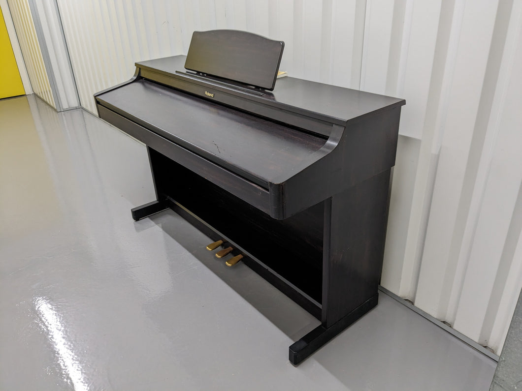Roland HP103e full size Digital Piano in dark rosewood finish stock nr 23034