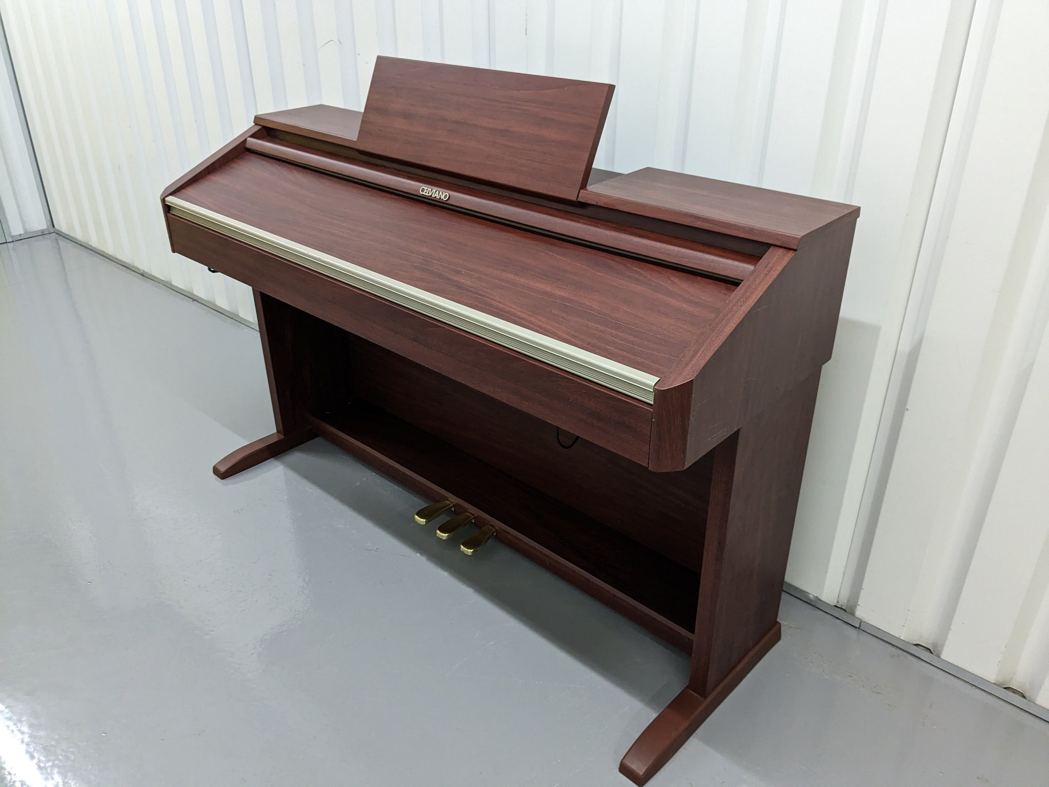 Casio Celviano AP-500 digital piano in mahogany colour stock number 23 –  Sulinda Music