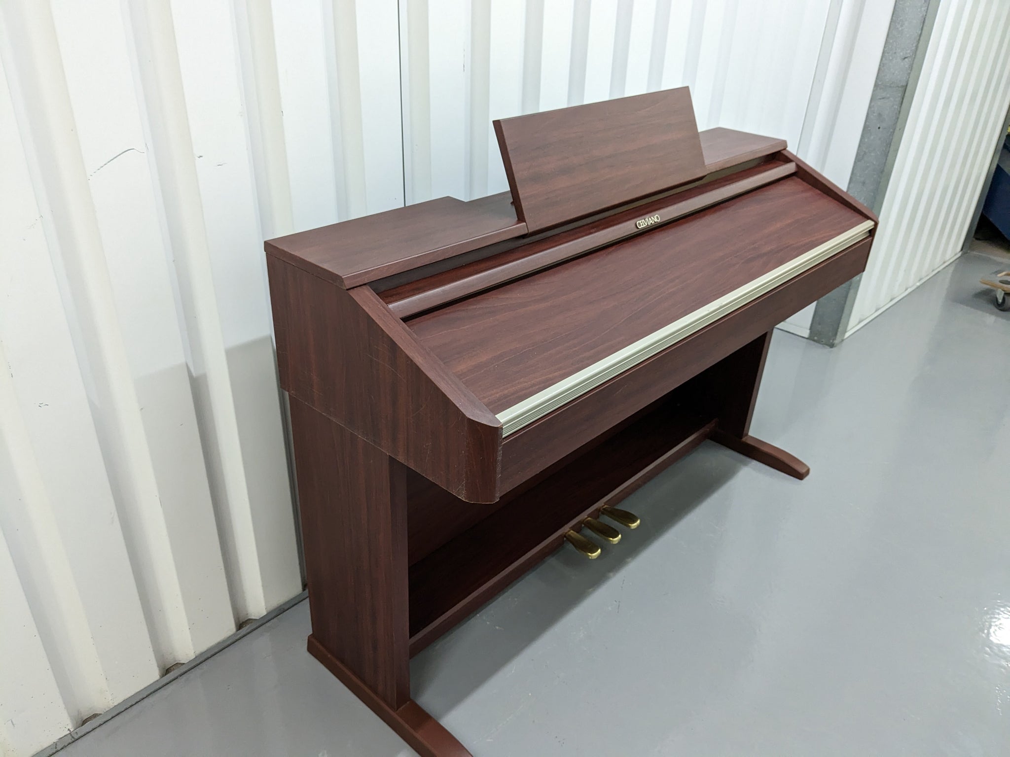 Casio Celviano AP-500 digital piano in mahogany colour stock number 23 –  Sulinda Music