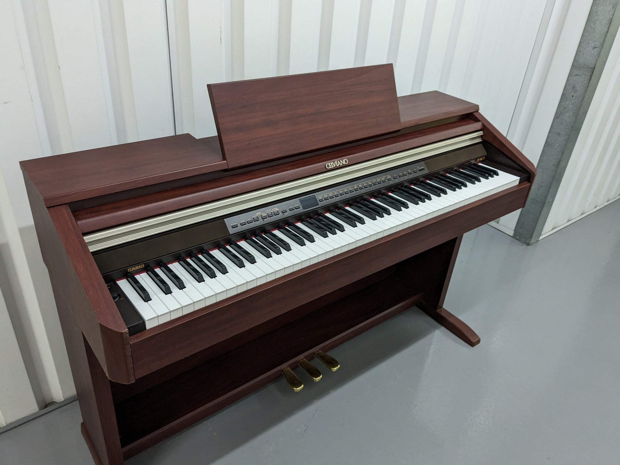 Casio Celviano AP-500 digital piano in mahogany colour stock number 23 –  Sulinda Music