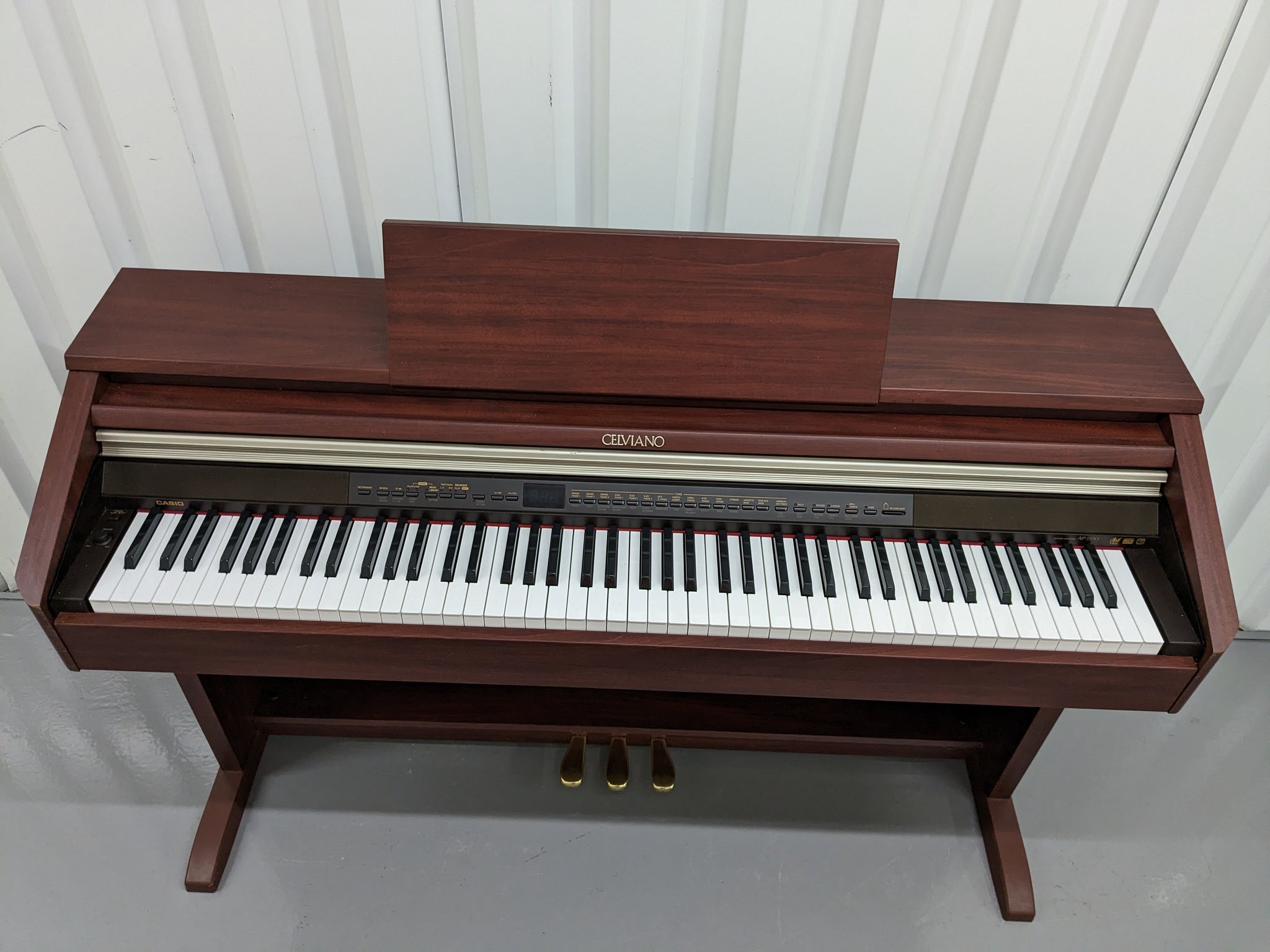 Casio Celviano AP-500 digital piano in mahogany colour stock number 23 –  Sulinda Music